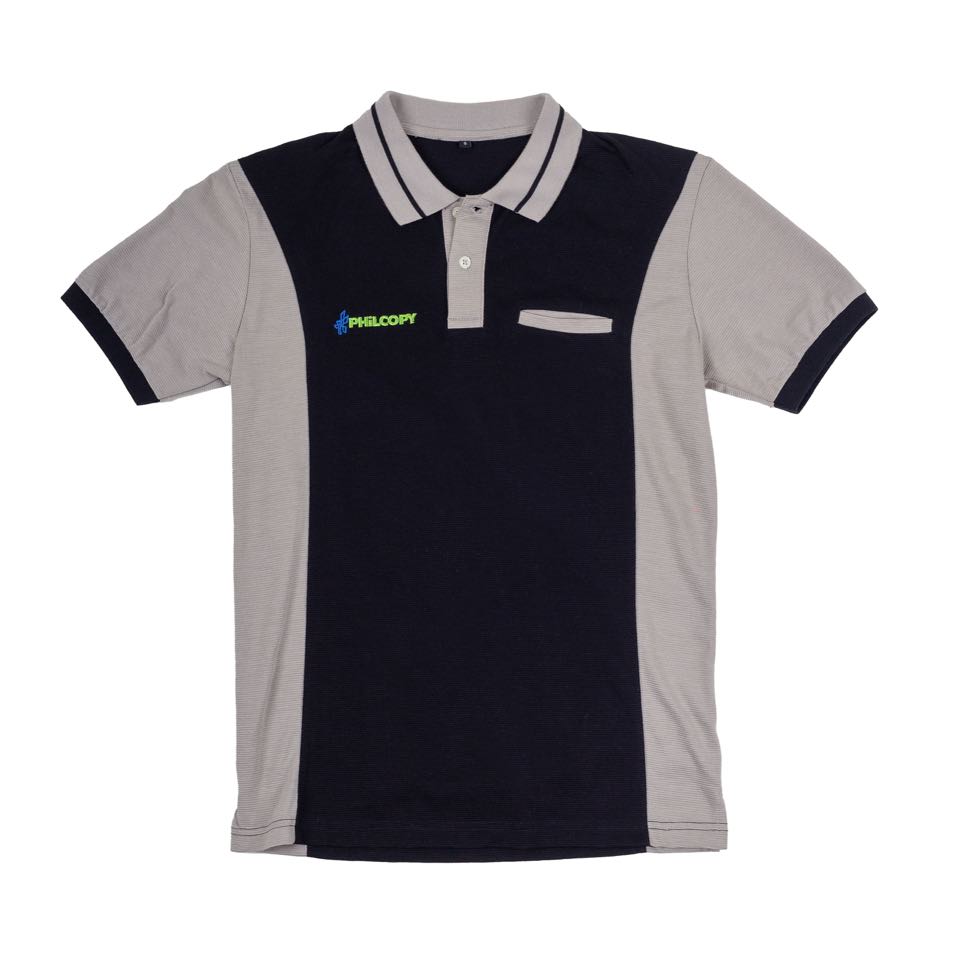 A navy and grey color-block corporate polo with contrast collar tipping, a chest pocket and an embroidered company logo.